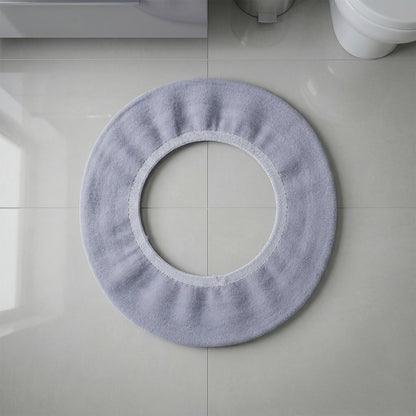 Stretchable toilet seat cover shown separately