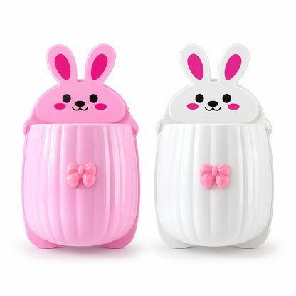 Front view of a pink and a white rabbit organizer, each with a cute face and a decorative bow, on a plain background.