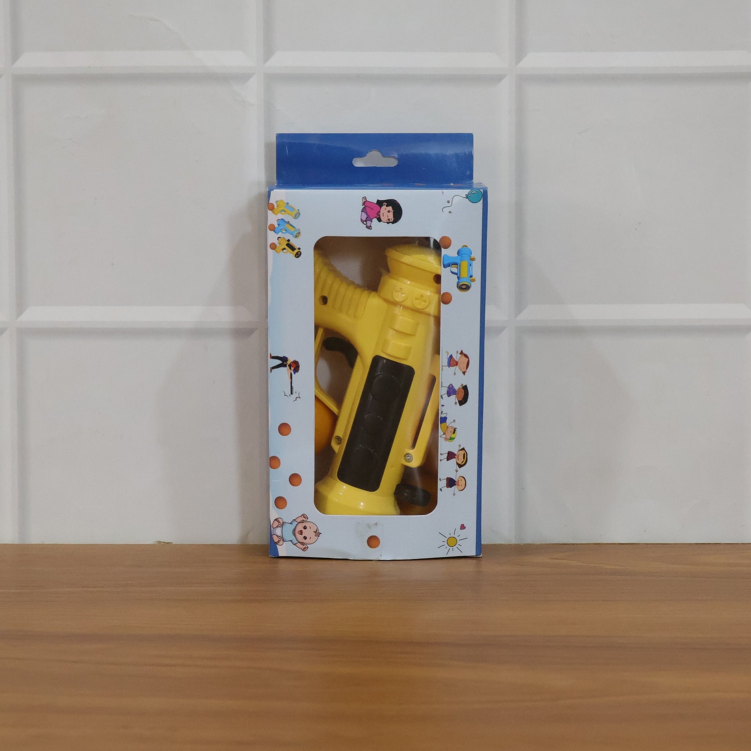 Child playing with Target Titan ball shooter toy gun