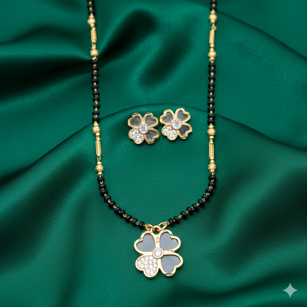 Floral mangalsutra set featuring a black bead chain and a luck clover pendant