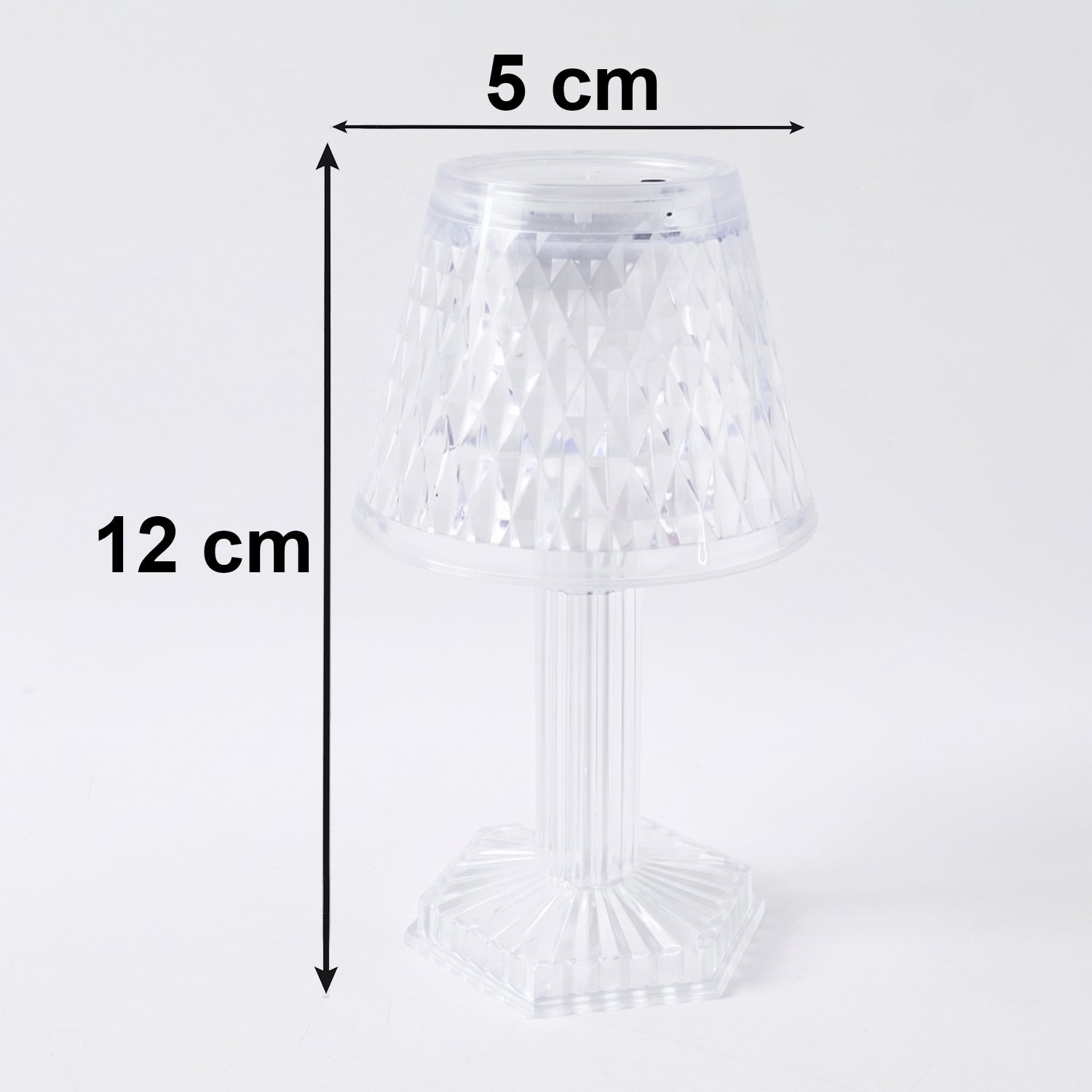 Small crystal lamp casting decorative light