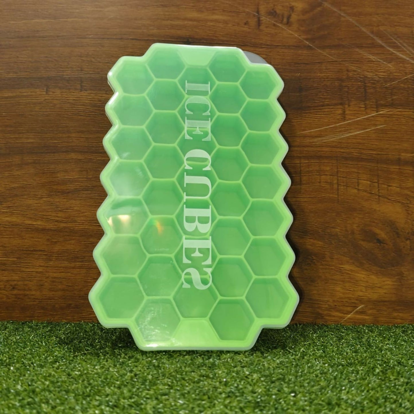Stacked honeycomb silicone ice trays showing compact freezer storage