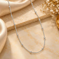 Women's Silver-Toned Snake Chain Necklace with Station Bead Accents for Everyday Wear