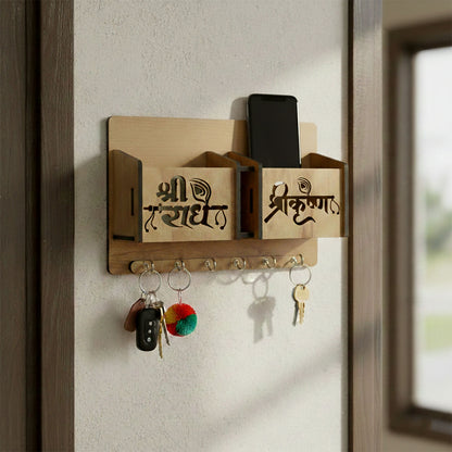 Close-up of engraved decorative lettering on wooden key holder
