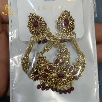 Maroon bead tassels hanging from vintage floral chandbali earrings