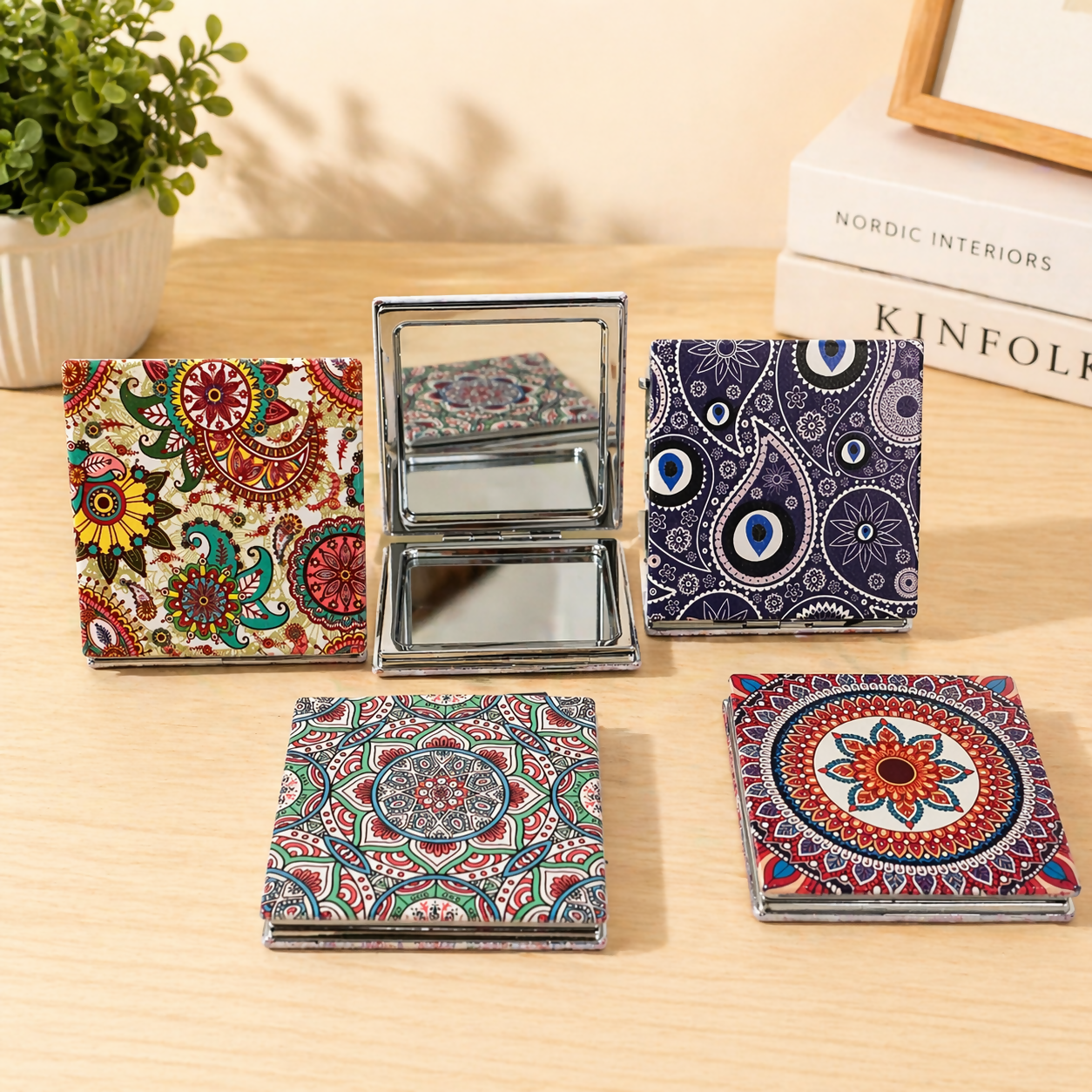 Stylish printed cover on pocket size folding mirror