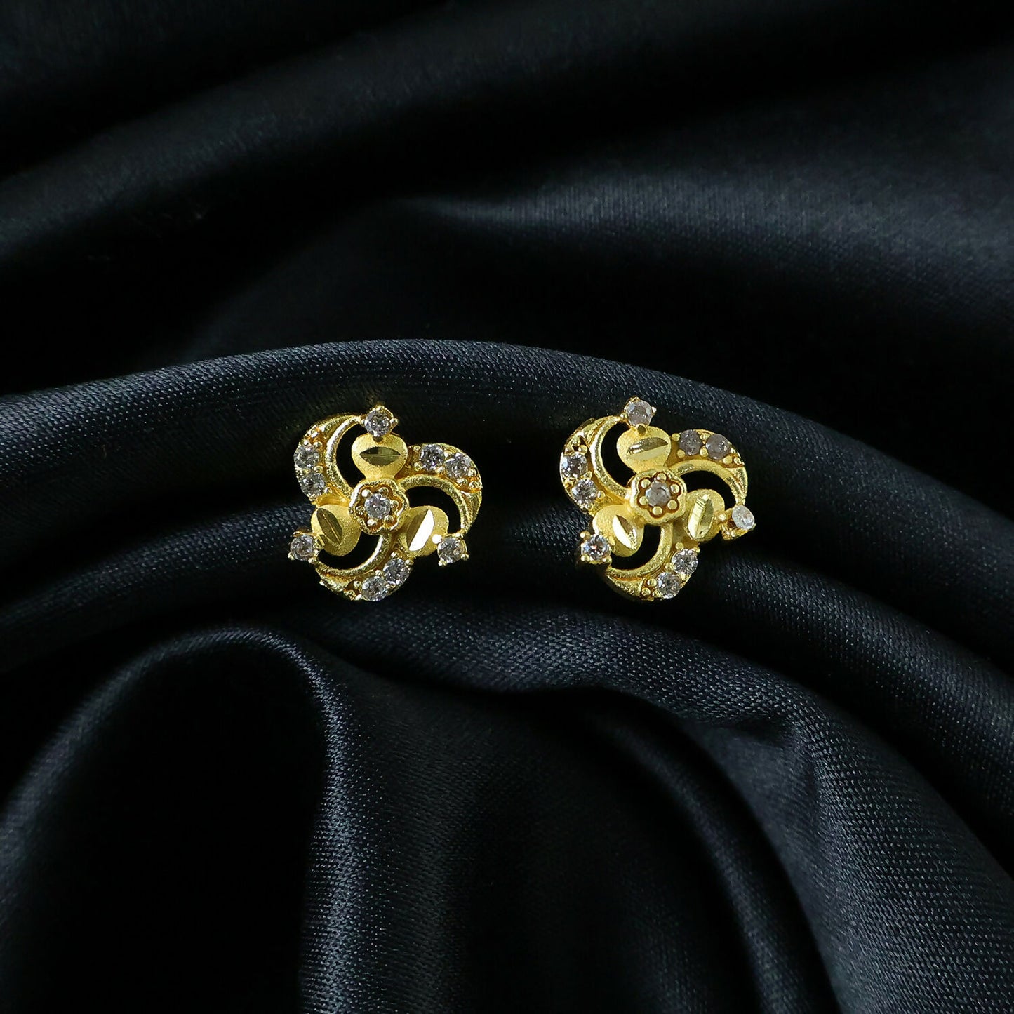 Elegant Floral Swirl Gold Stud Earrings with Crystal Detailing