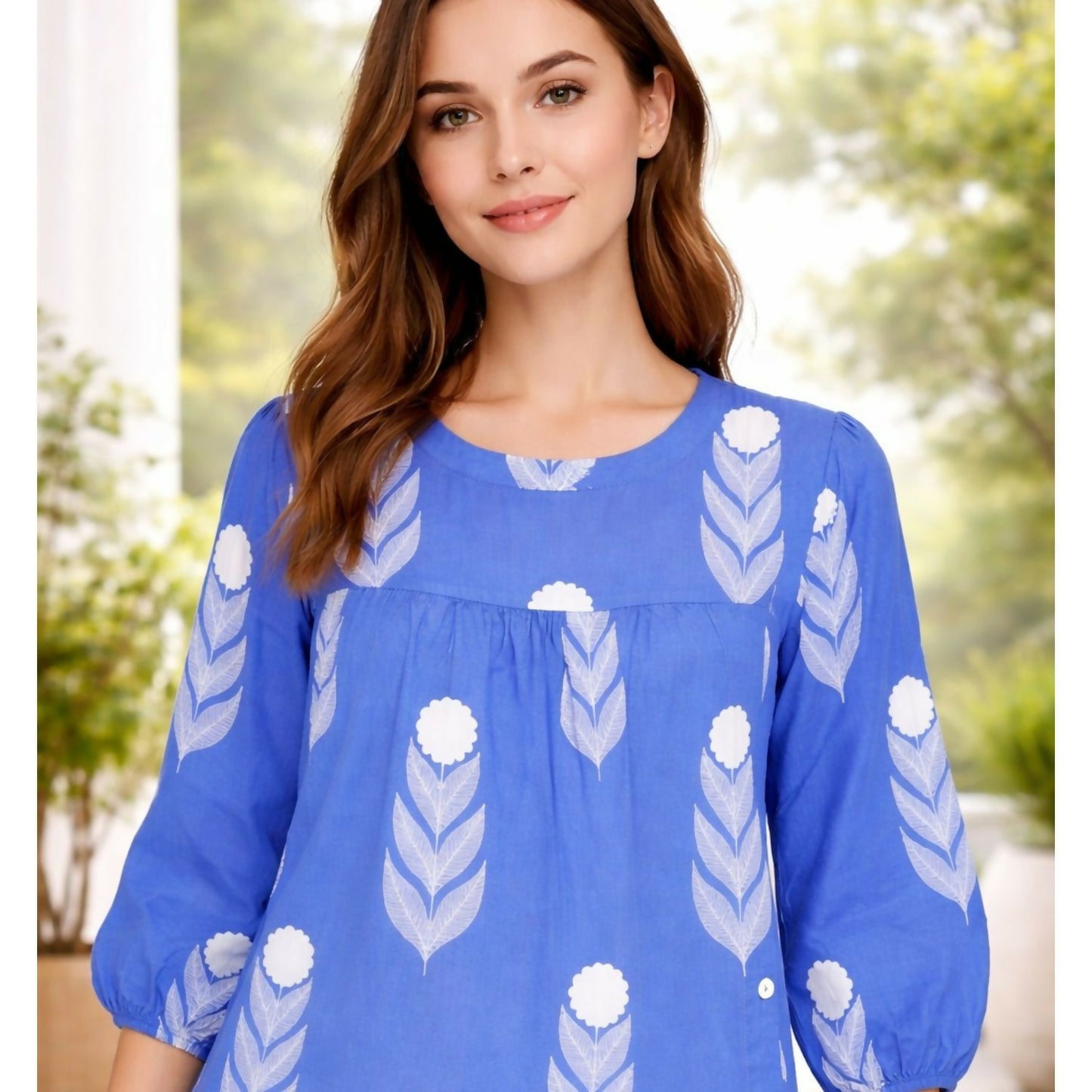 Side button styling on the blue cotton short kurti