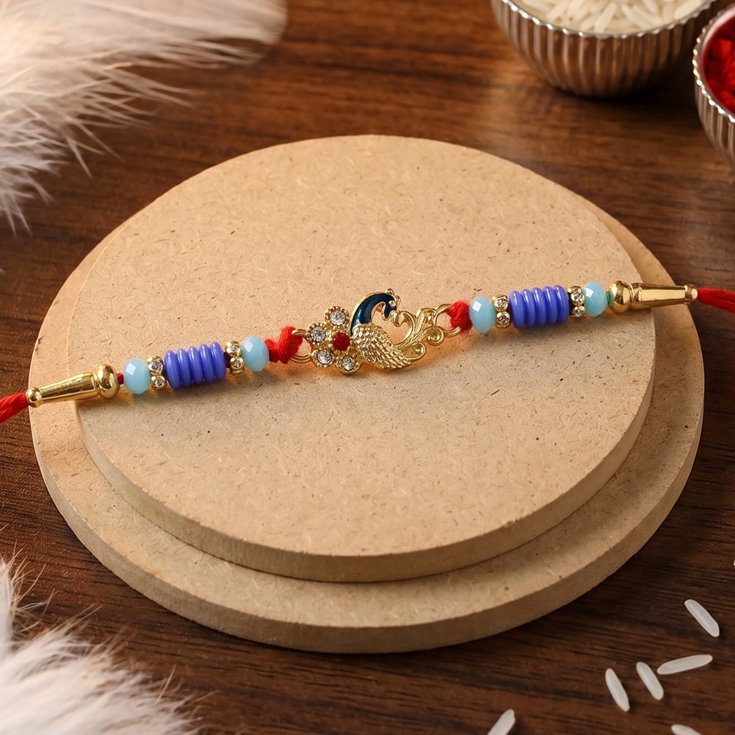 Side angle of Antique Mini Peacock Designer Rakhi