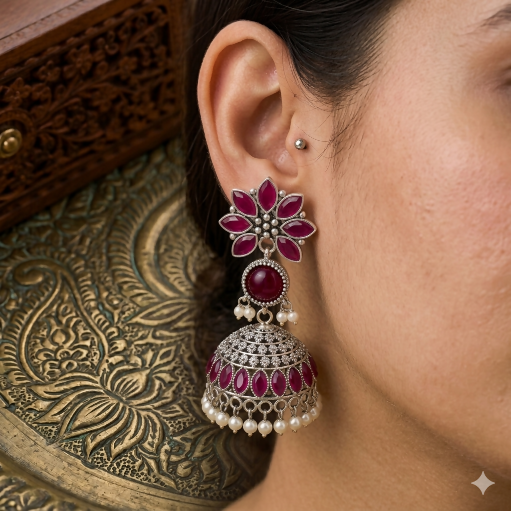 Front view of Indian Jhumkha earrings featuring multi-tonal crystal floral stud and lilac stone inlay