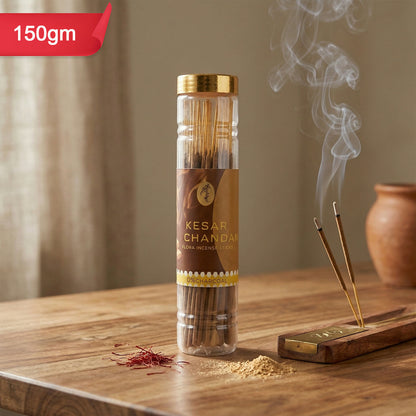 Hand holding Kesar Chandan incense sticks with charcoal-free label