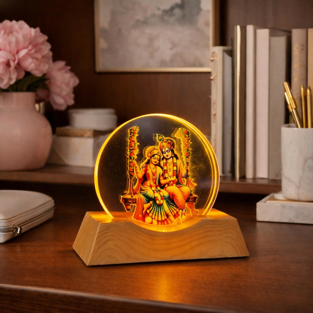 Side view of Radha Krishna LED lamp with warm glowing light