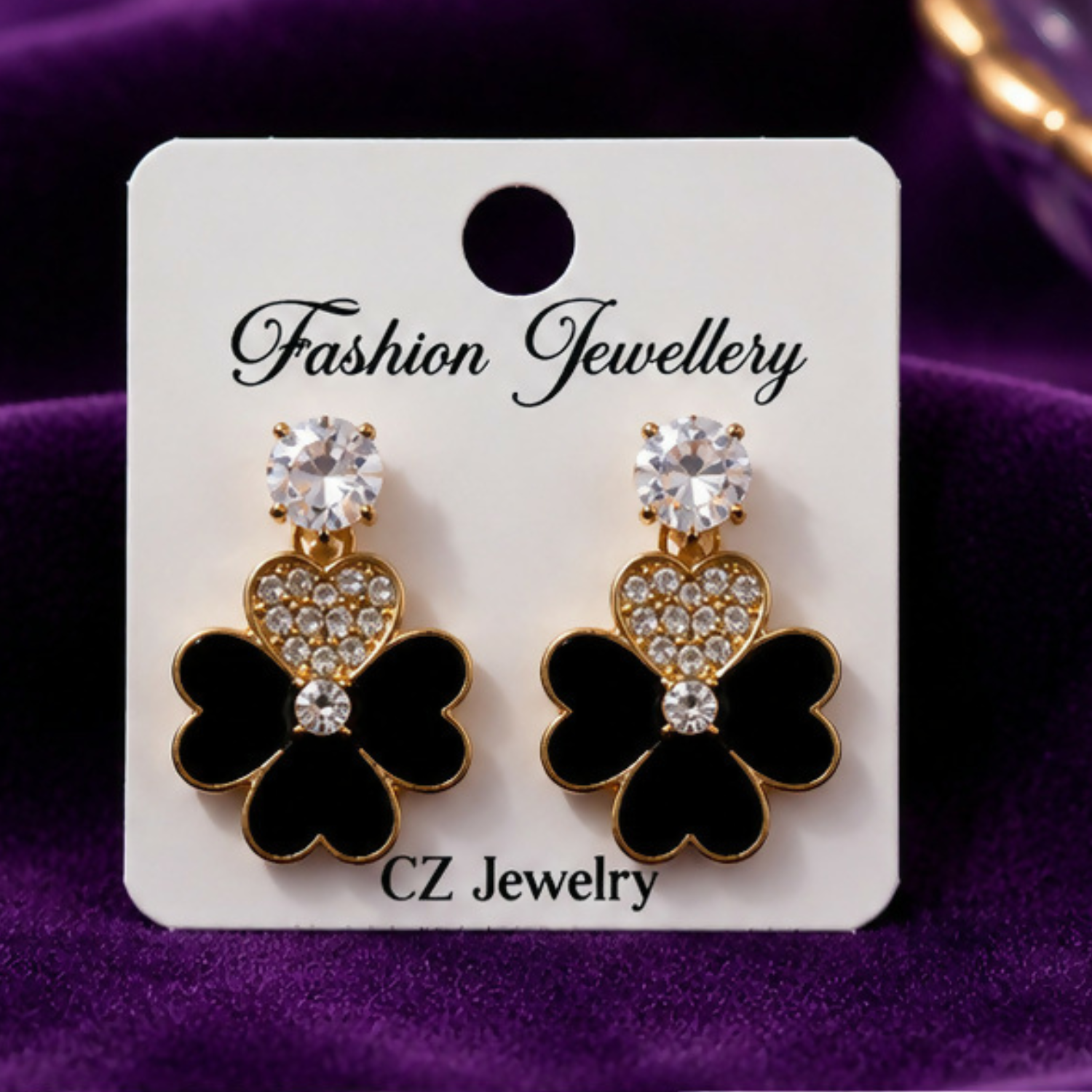 Black Clover Charm Earrings with Heart-Shaped Crystal Accent and Gold-Tone Finish