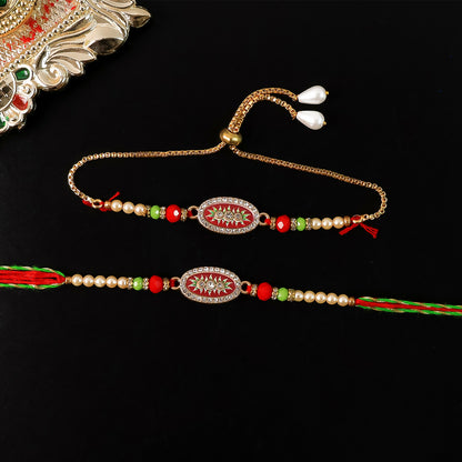 Close-up of red oval dial Rakhi with pearl accents
