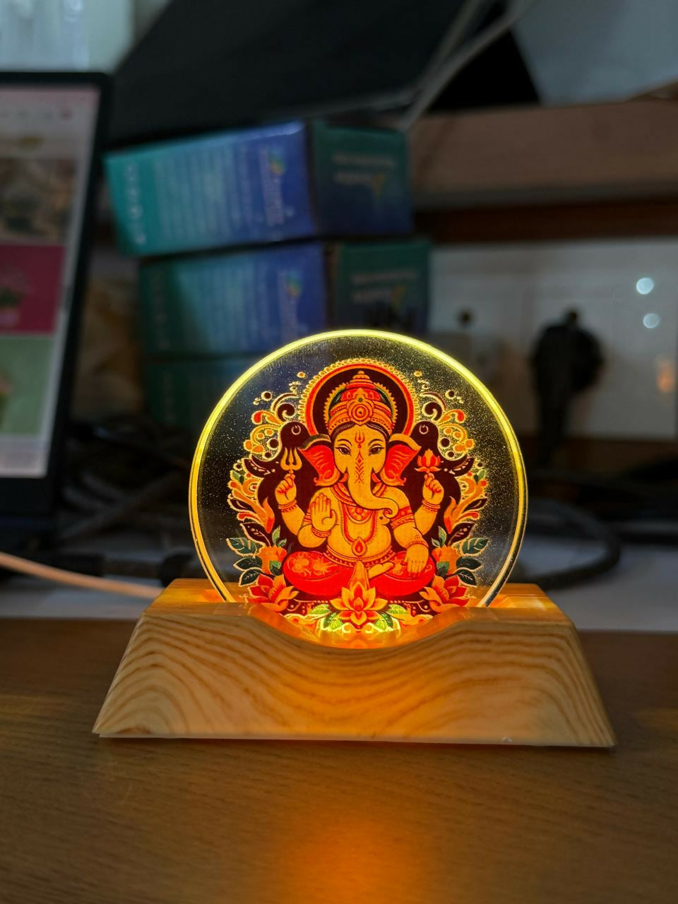 Side view of LED Lord Ganesha acrylic lamp with wooden base