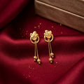 Elegant Gold Floral Drop Earrings with Twin Chains and Textured Bead Charms