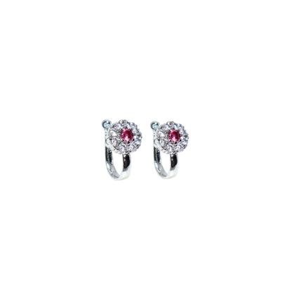 Close-up of Double-Row Hoop Nose Rings showcasing sparkling CZ stones in black and pink hues