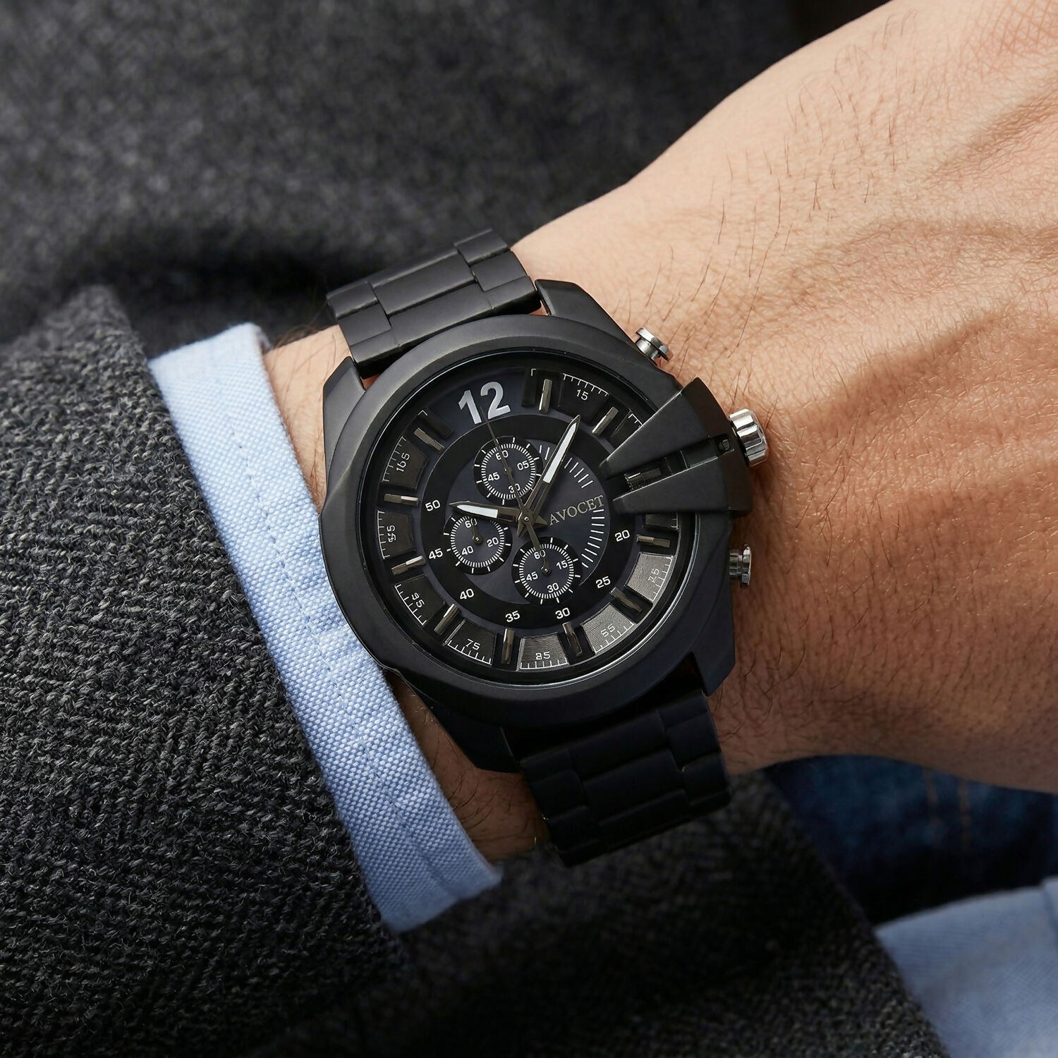 Black wrist watch showing detailed chronograph dial