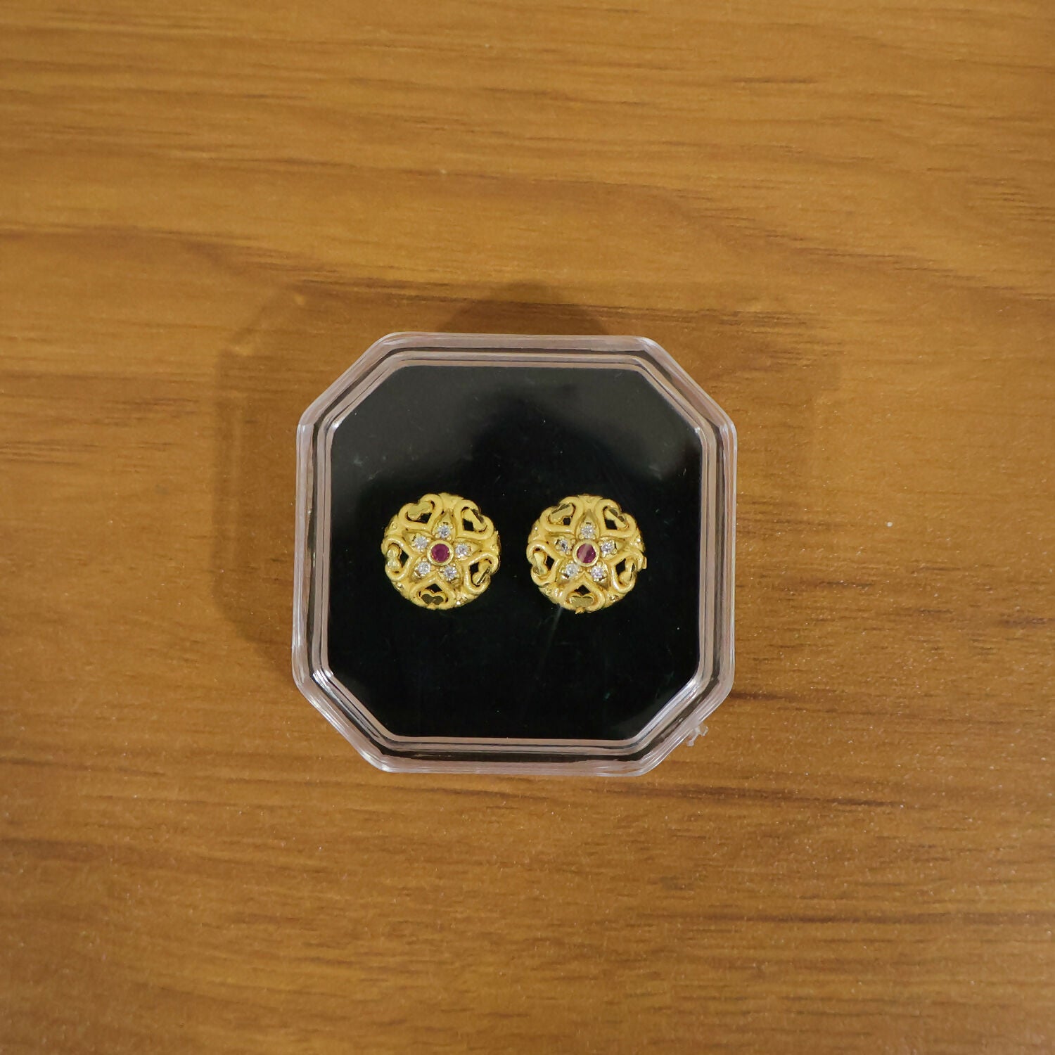 Elegant gold floral stud earrings suitable for traditional Indian outfits