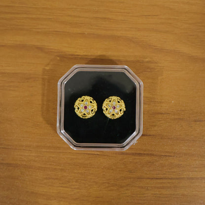 Elegant gold floral stud earrings suitable for traditional Indian outfits