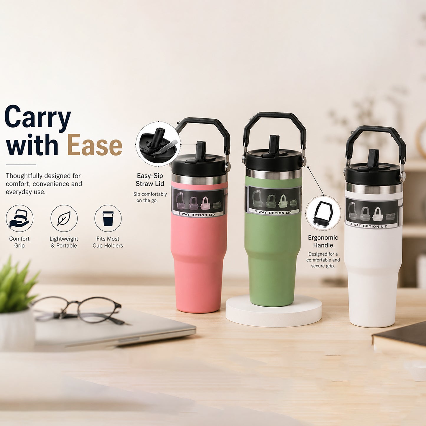 Three insulated tumblers in pink, green, and white with handles stand on white pedestals, with feature callouts.