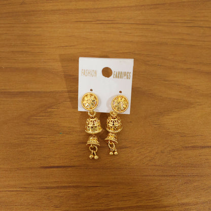 Front view of ethnic gold jhumka earrings with floral design