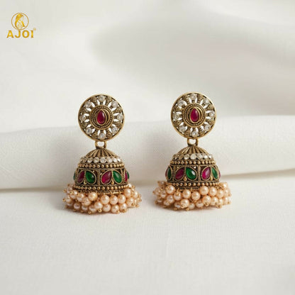 Side view of Royal Pearl Drop Antique Gold Jhumka Earrings