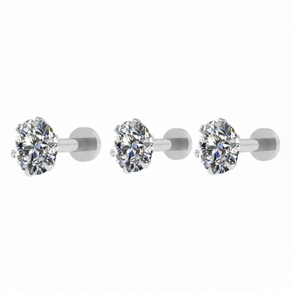 Close-up of silver plated round solitaire stud earring highlighting flat back design