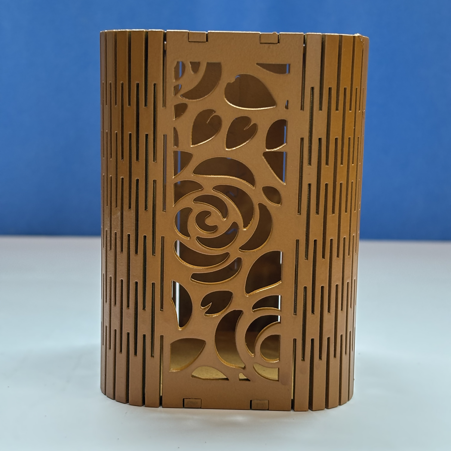 Lifestyle shot of the lotus wooden pen holder filled with art supplies, suitable for artists and students.
