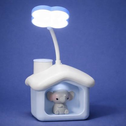 Close-up of coin slot on elephant desk lamp