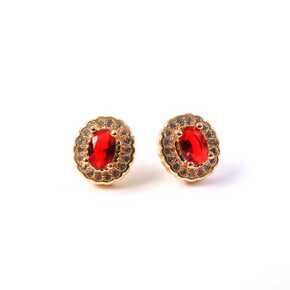 Pair of red stone stud earrings with delicate crystal halo for festive occasions