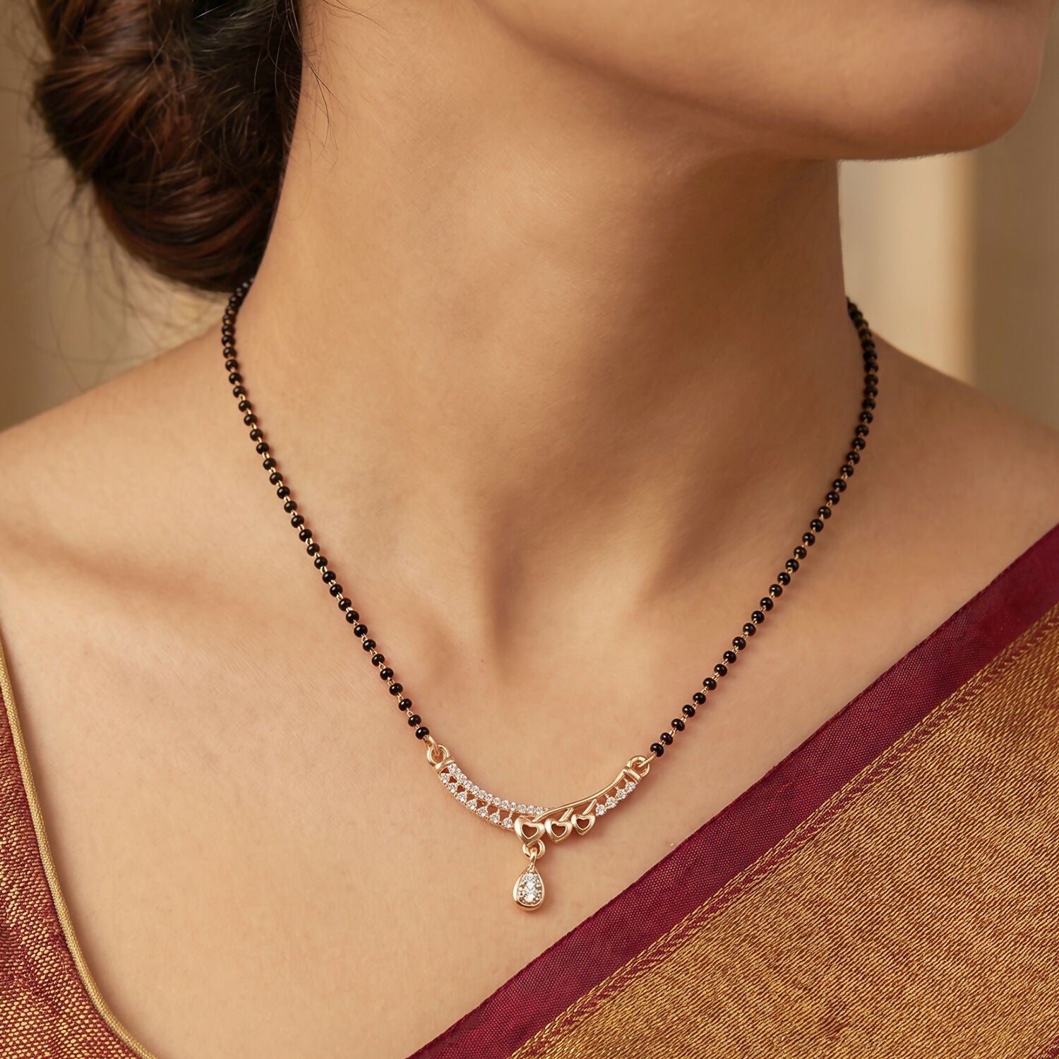 Traditional black bead chain with modern teardrop mangalsutra pendant