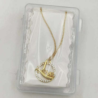 Stylish gold plated Love Script Circle Pendant Necklace worn to complement a classy outfit