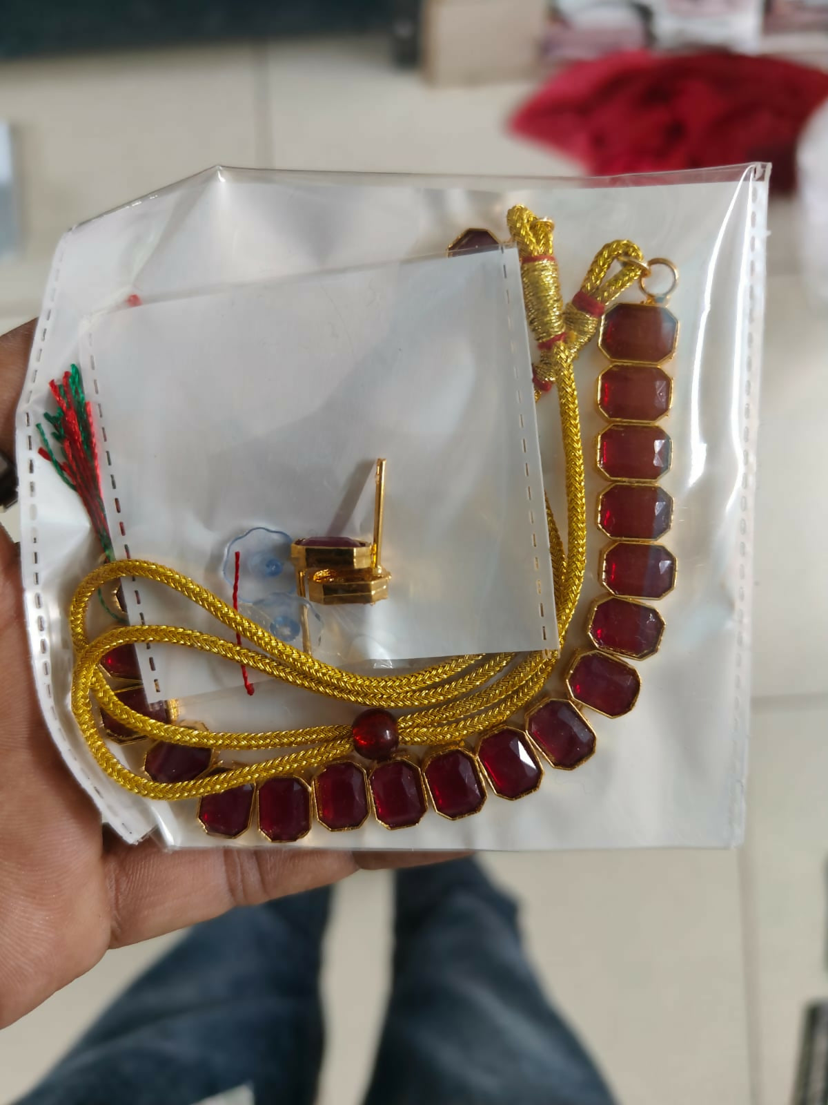 Regal Gold-Toned Choker Set with Ruby/Maroon Stones