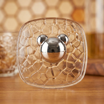 Set of 3 clear plastic adhesive wall hooks displayed on a surface