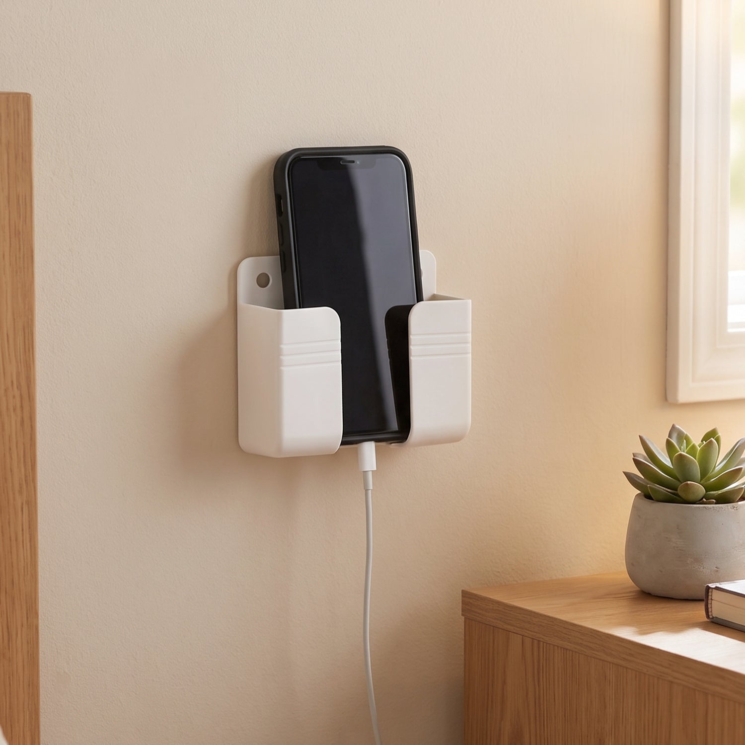 Adhesive strip on the back of the wall holder