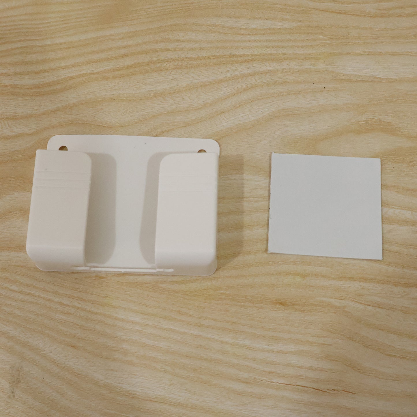Live photo of self adhesive wall mounted phone holder
