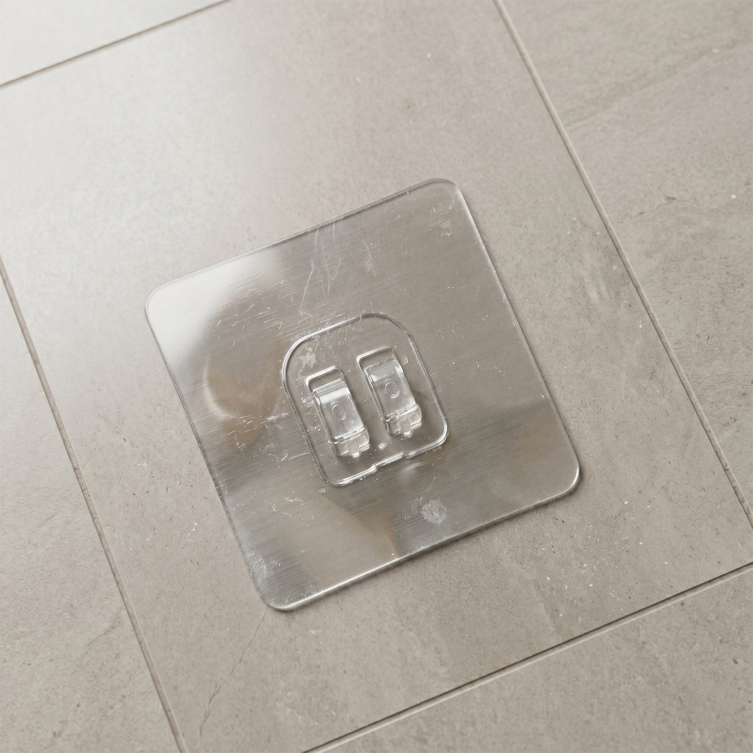 Transparent adhesive wall hook holding keys & small accessories