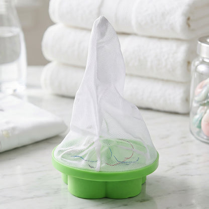 ReusAble laundry lint catcher floating inside washing machine
