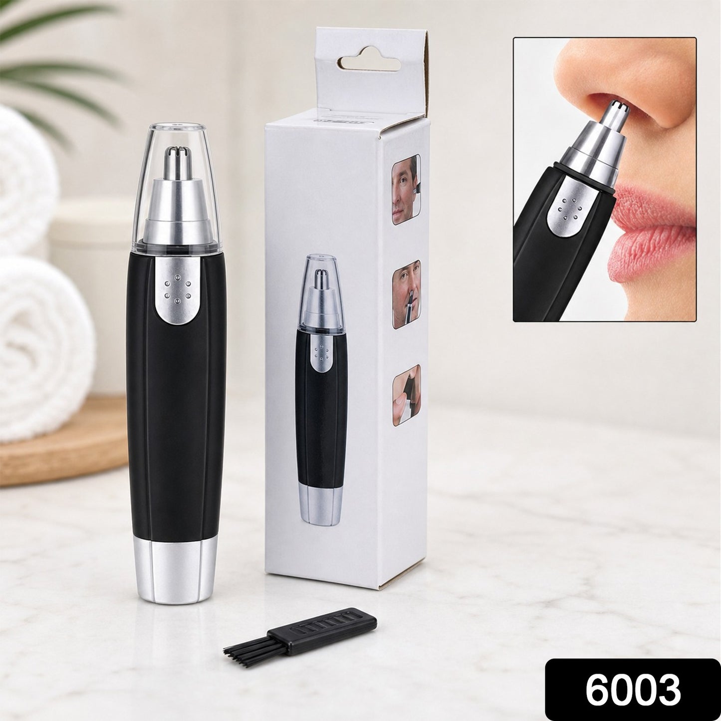 Close-up of ear and nose hair trimmer showing stainless steel blade