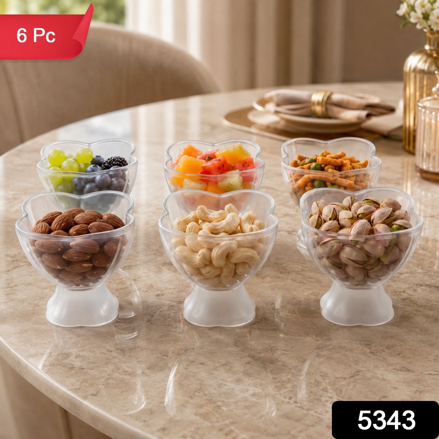 Six clear plastic dessert bowls filled with snacks and fruits on a marble table, with a red 6 Pc label.