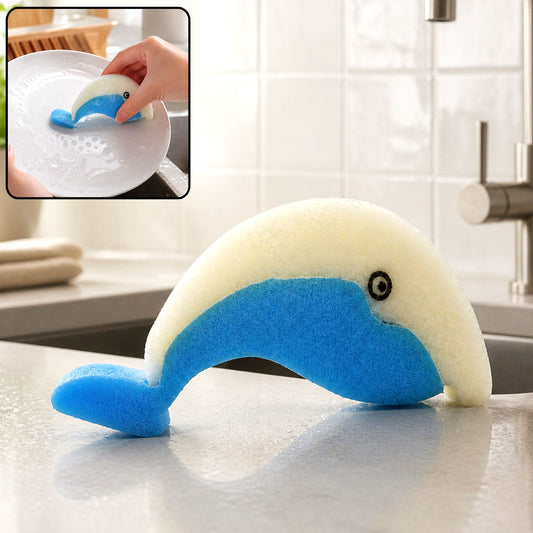 A blue and white dolphin-shaped sponge rests on a kitchen counter, with an inset showing it cleaning a plate.