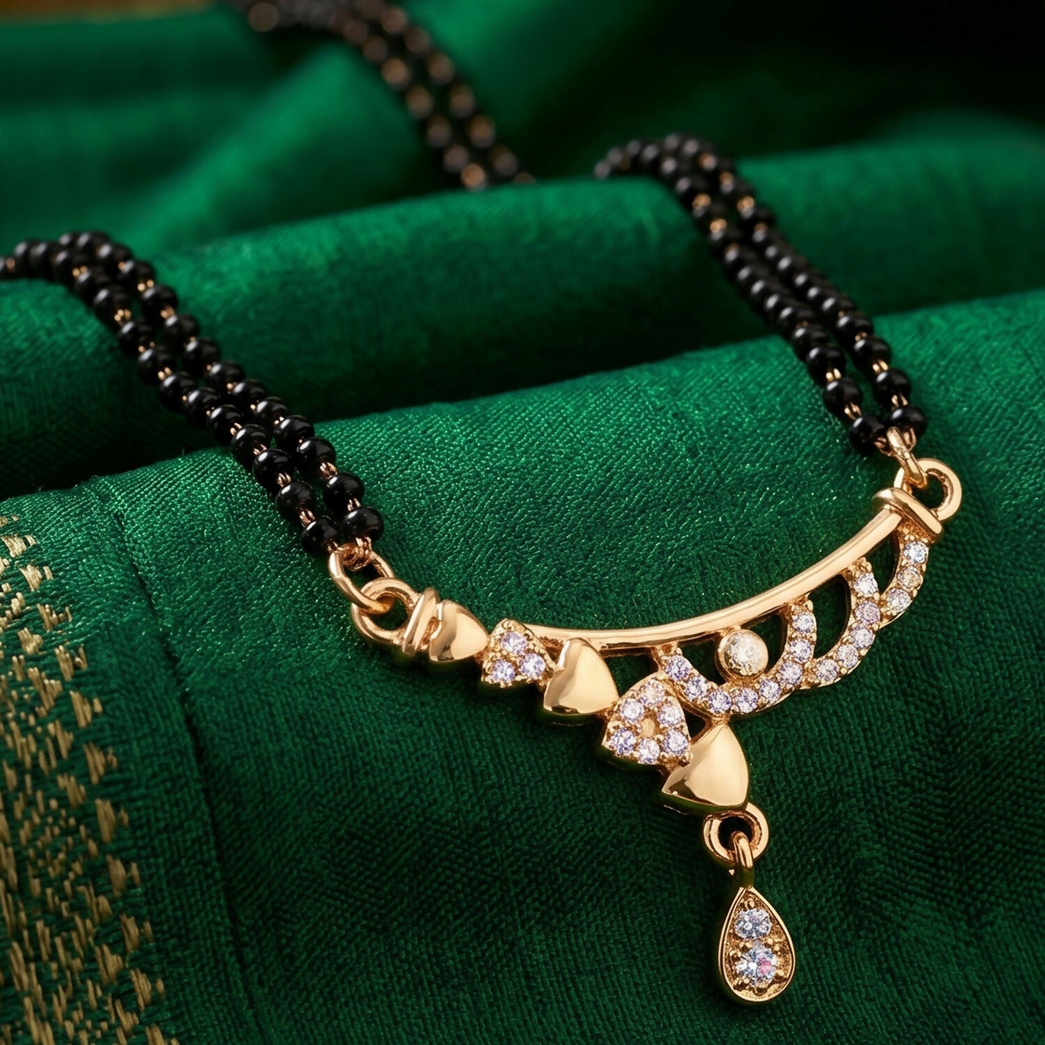 Rose Gold Finish Triple Strand Heart Charms & CZ Bar Mangalsutra with Teardrop Drop