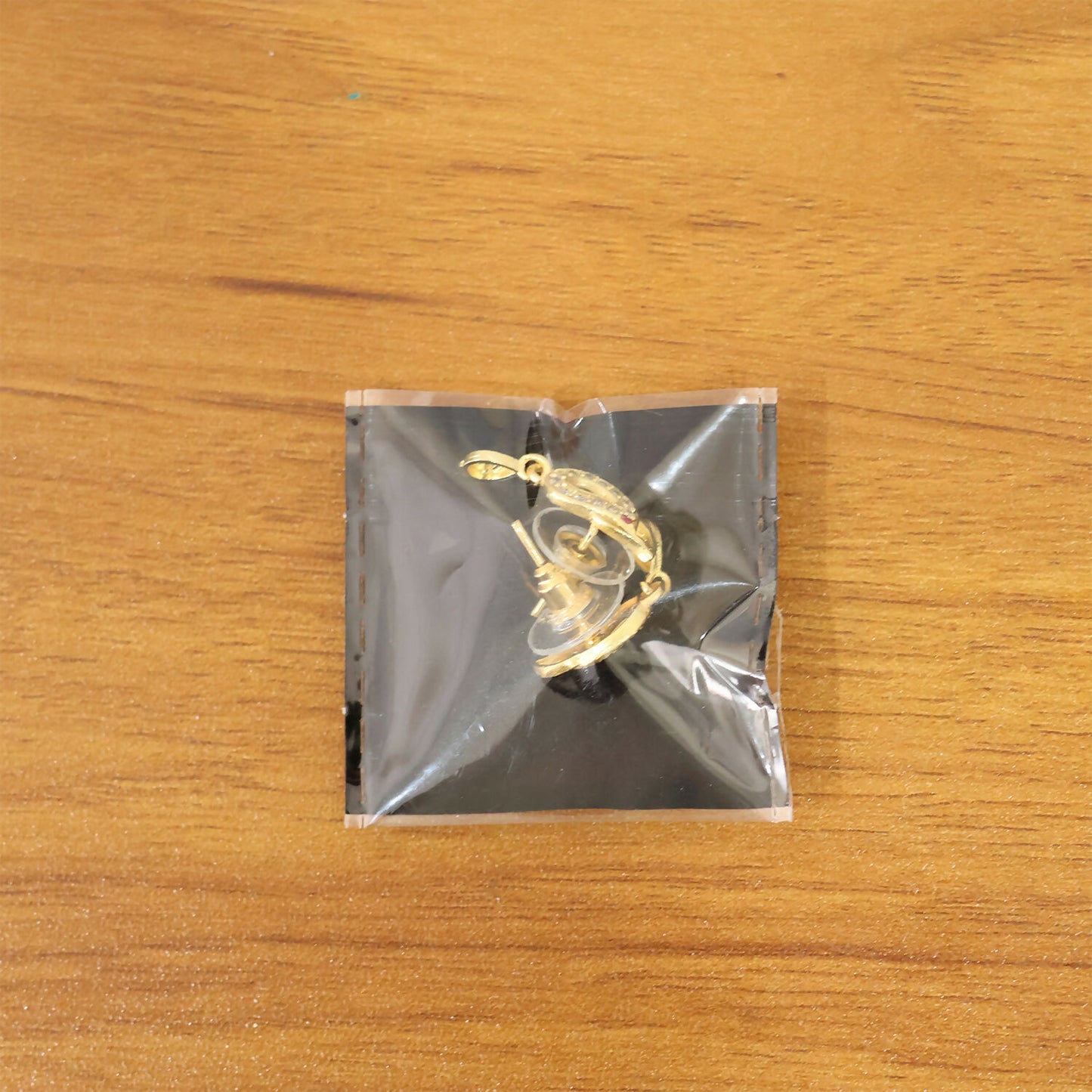 Traditional Gold Finish Paisley Earrings with Crystal & Ruby Touch