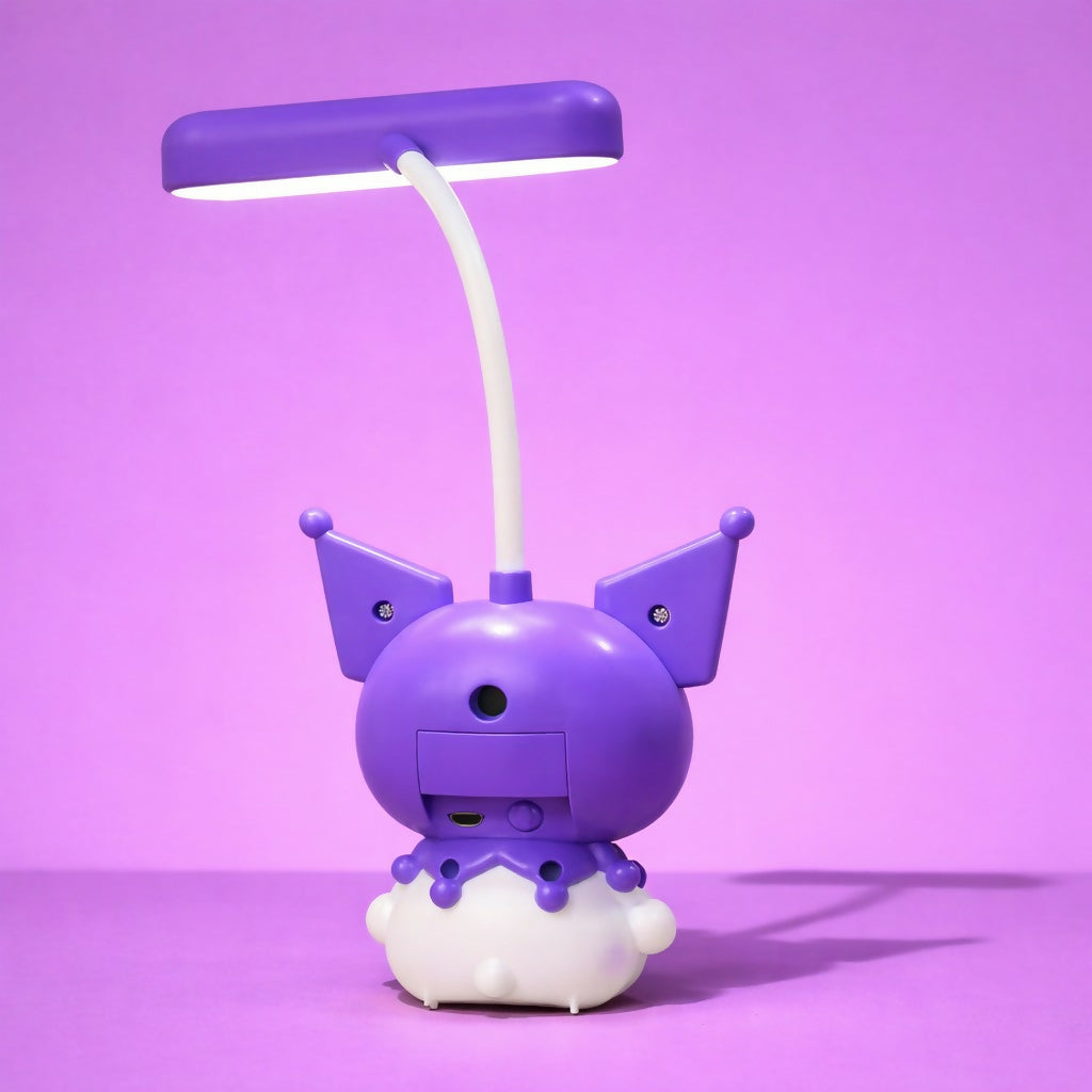 LED desk lamp with cute cartoon character base illuminated on study desk