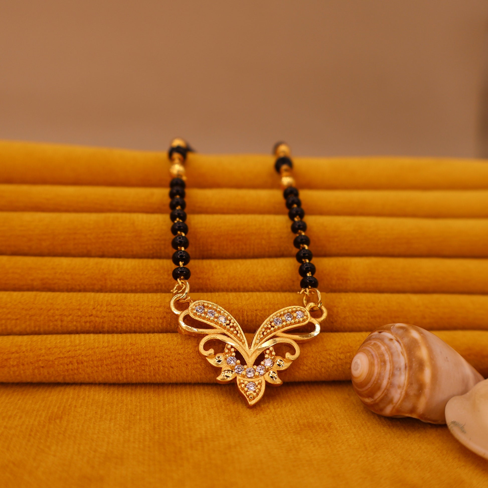 Gold-Plated Floral Butterfly Mangalsutra with Black Beads