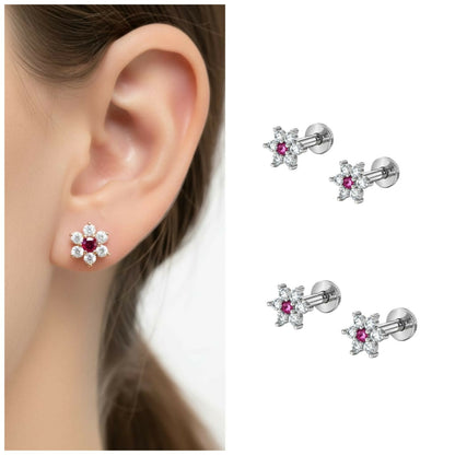 Silver plated ruby and crystal flower stud earrings showing vibrant ruby-center and clear crystals