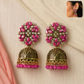 Jhumka Earrings – Traditional Gold Finish with Pink Stones