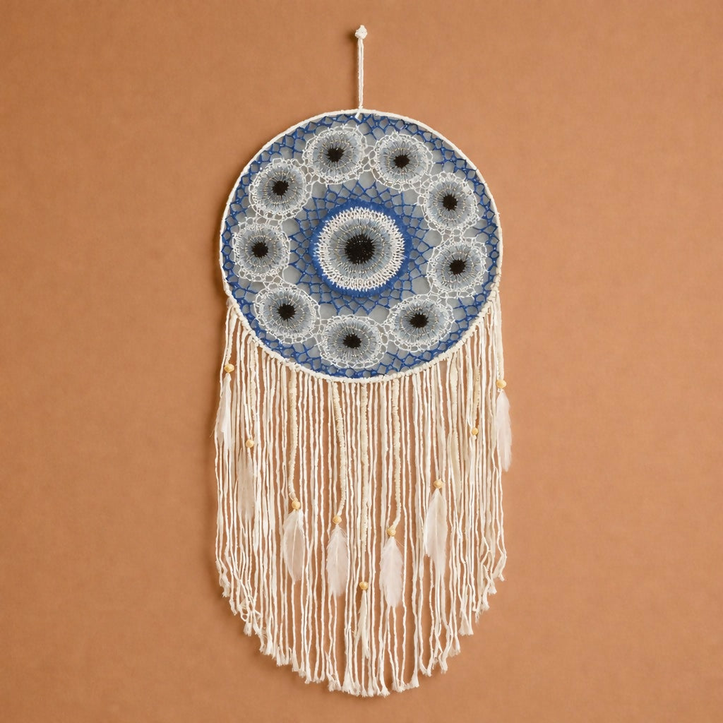 Side view of feather tassel accents on dream catcher decor