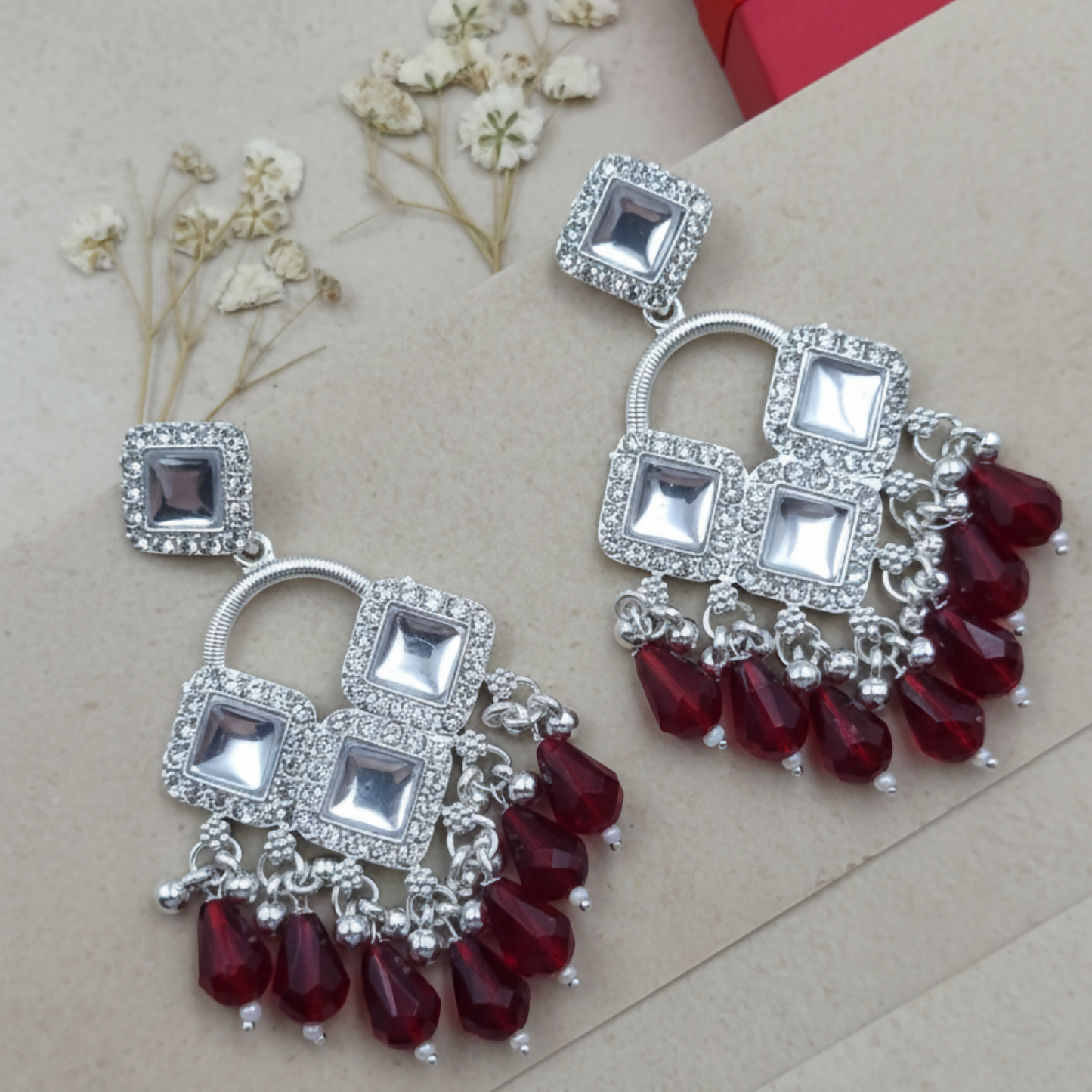 Elegant Silver Plated Chandelier Earrings Featuring Square Crystals and Maroon Teardrop Beads